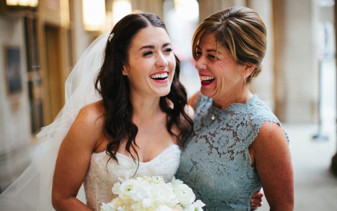 moms and daughter at wedding